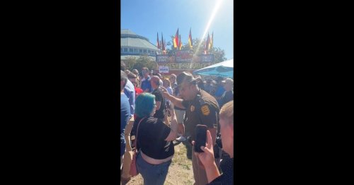 watch:-blue-haired-punk-confronted-by-police-after-attacking-desantis-supporter