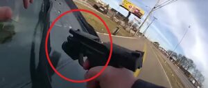 horrifying-video-shows-cop-shooting-woman-as-she-mows-him-down-with-car