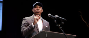 new-york-city-mayor-eric-adams-cuttting-aid-to-migrants
