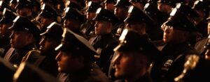 police-academy-director-signs-graduation-certificates-in-chinese