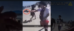 video-shows-cops-confront-teen-appearing-to-point-gun-at-crowd-on-florida-beach