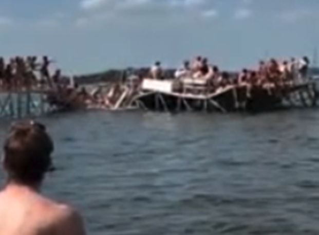 watch:-overpacked-pier-collapses-with-dozens-of-college-students