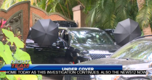 after-homeland-security-raids,-diddy-shields-miami-mansion-with-umbrellas