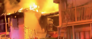 ‘it’s-way-too-hot’:-video-shows-police-desperately-trying-to-rescue-11-year-old-from-raging-fire