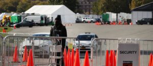 mob-rushes-man-and-injures-security-guard-at-migrant-shelter-during-brawl,-police-say:-report