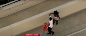 video-appears-to-show-woman-try-to-stab-man-after-car-crash