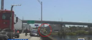 video-shows-police-chase-end-in-suspect-jumping-over-expressway-ramp-into-water