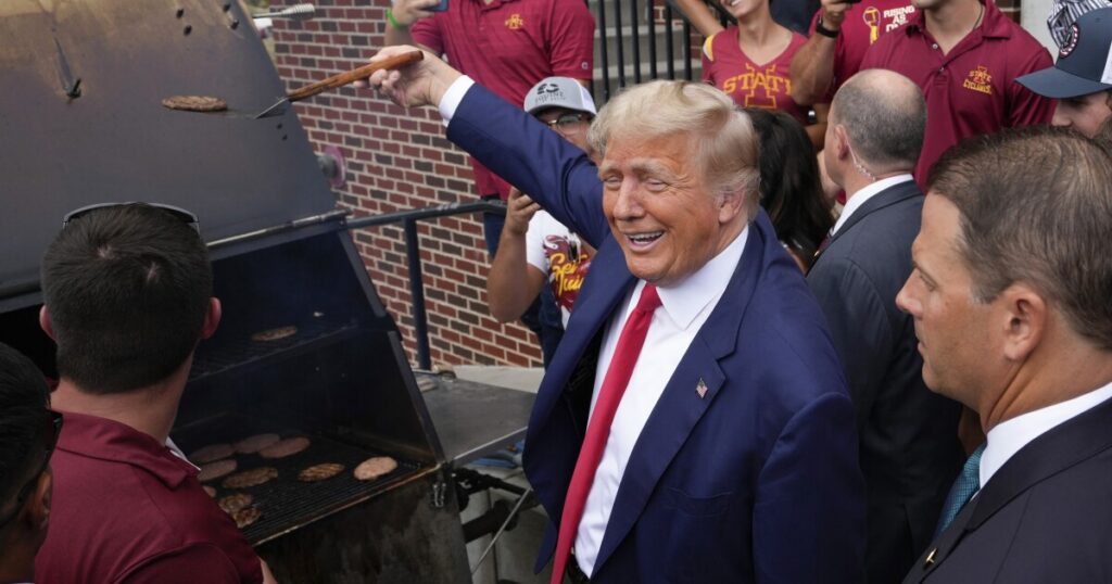 trump-flips-burgers-with-fans-at-tailgate-for-iowa-iowa-state-matchup
