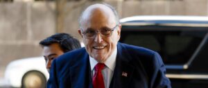 rudy-giuliani’s-grinning-mugshot-released
